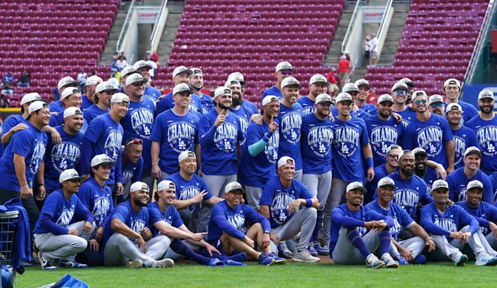 Dodgers posing for a team photo in division champs t-shirts