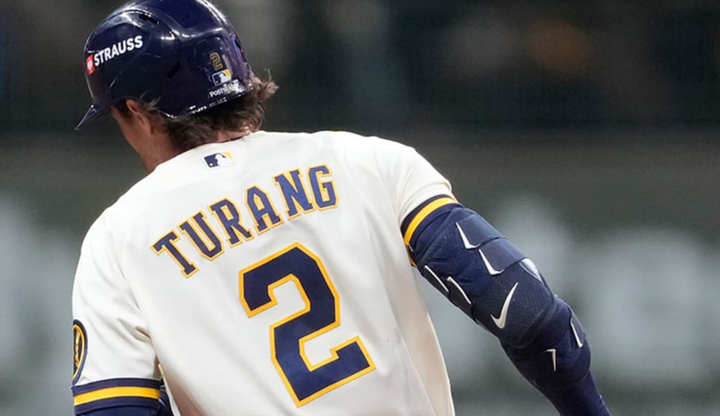Brice Turang rounding the bases
