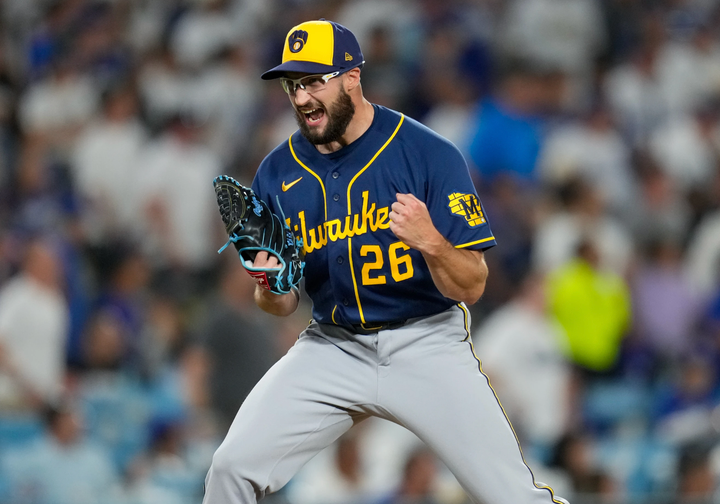 Ashby of the Brewers celebrates the final out