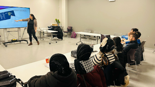 Mona Awwad teaching workshop attendees.