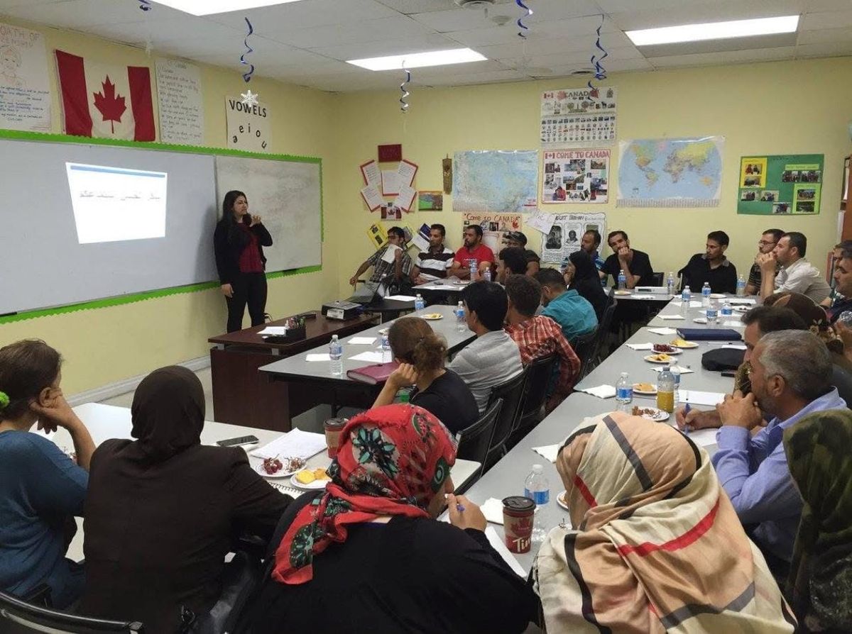 Mona teaching immigrants in Toronto.