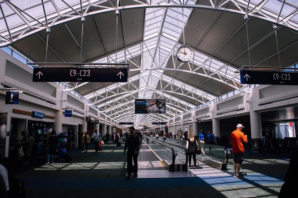 Inside of an airport where gates are located.