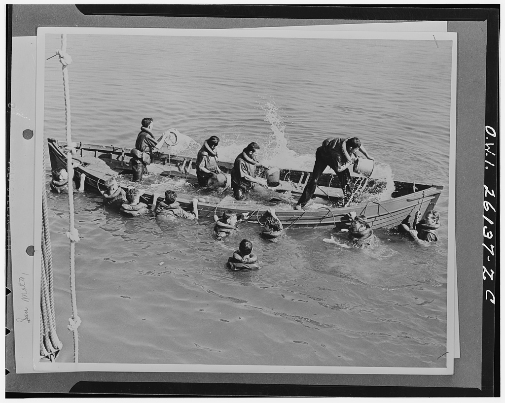 San Mateo, California. Bailing out a life boat at a United States Merchant Marine Cadet basic school. 1943.
<p>4 cadets on a lifeboat full of water are bailing out while 9 are in the water mostly clinging to the sides." class="wp-image-858"><figcaption>Solving hard problems has to start somewhere.</figcaption></figure></p>
<!-- /wp:image -->
<!-- wp:paragraph -->
<p>I'm very pleased to announce that the <a href=