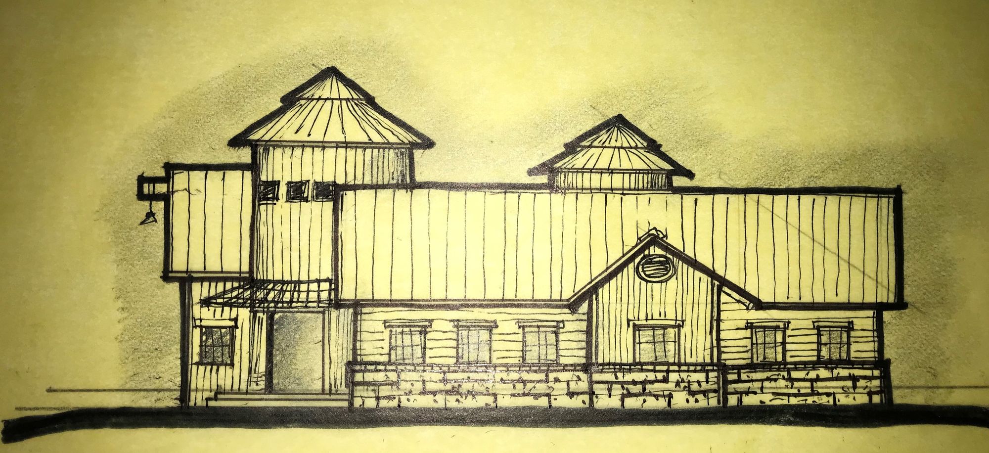 Pencil sketch of a rustic two-story building with turrets on yellow paper.