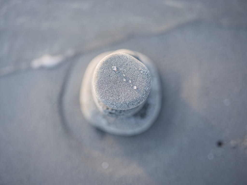 A balanced stack of stones representing inner stability