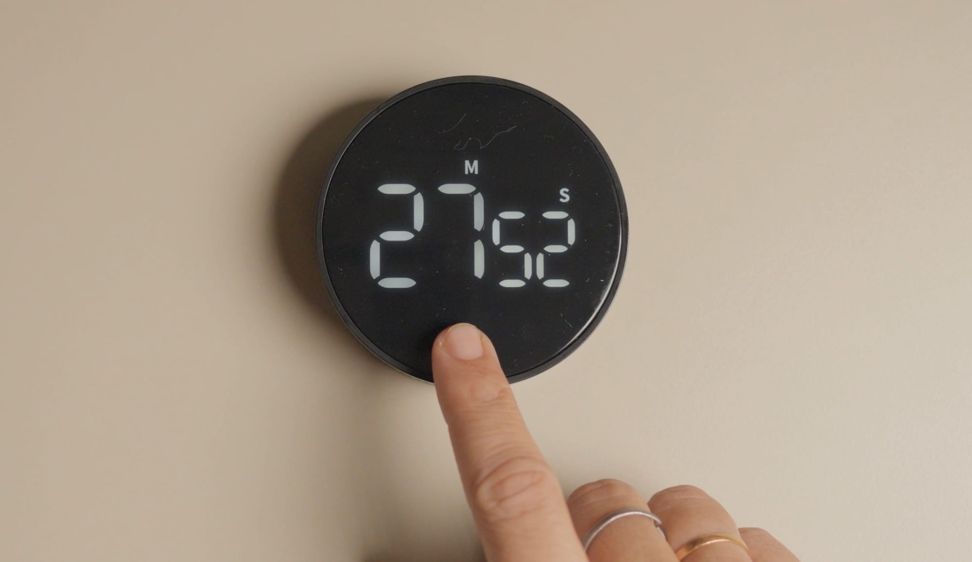 press the button to pause or start the timer