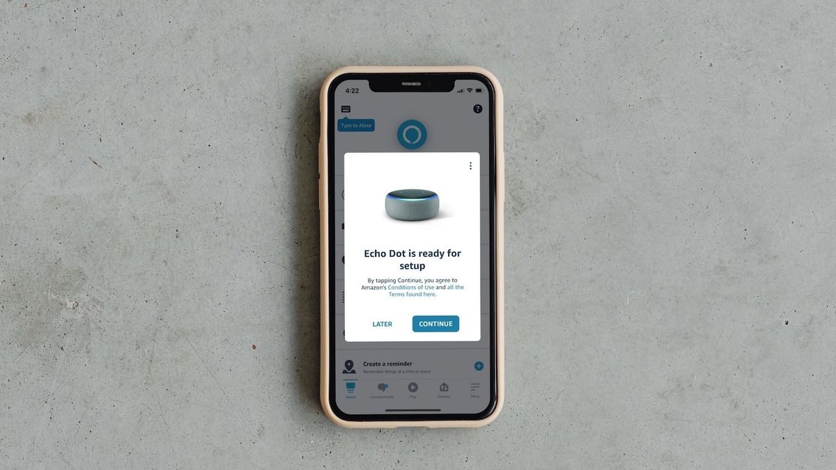How to Set up Amazon Echo Speakers with iPhone - iPhone on floor showing Echo Dot setup screen