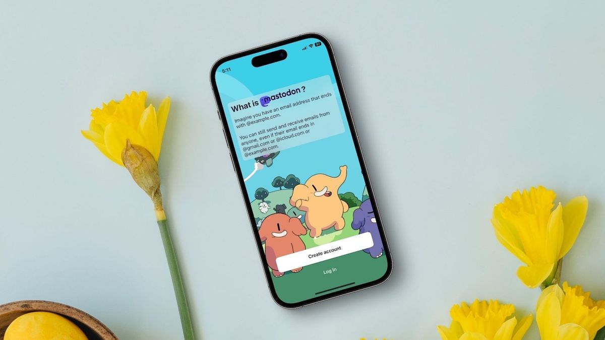 Mastodon app open on iPhone on a table