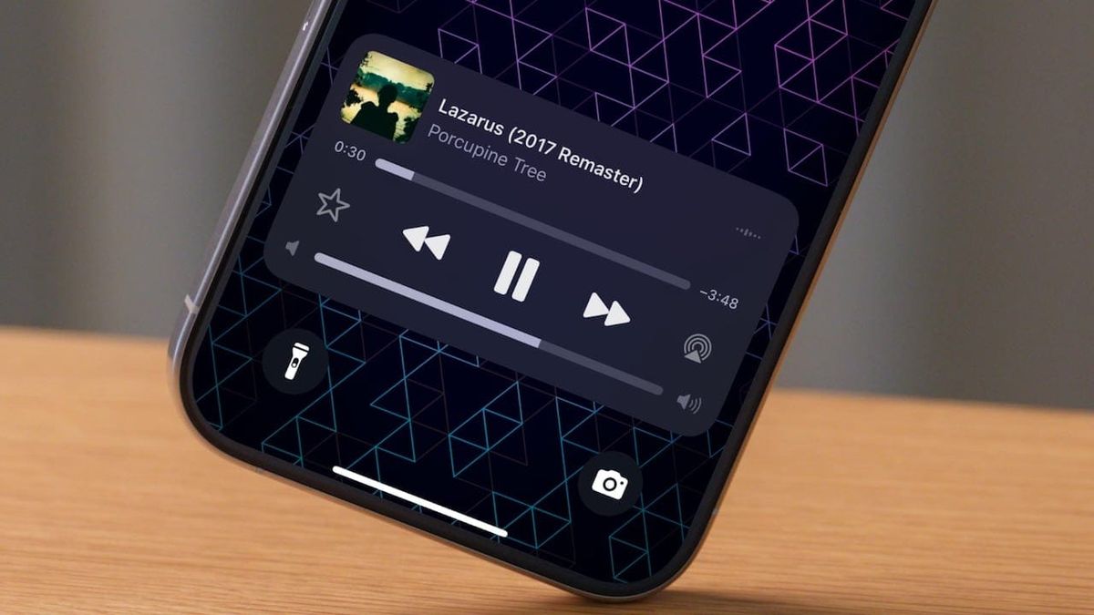 iPhone lock screen showing volume control slider