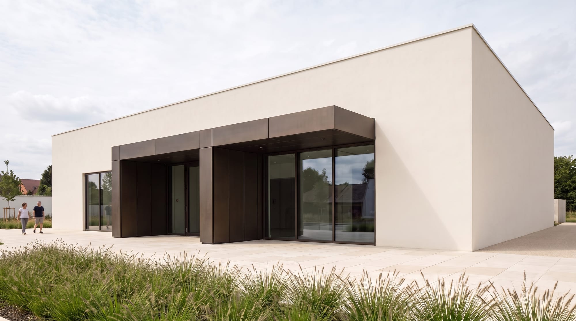 Contemporary pavilion under soft overcast daylight with restrained reflections and shadows.