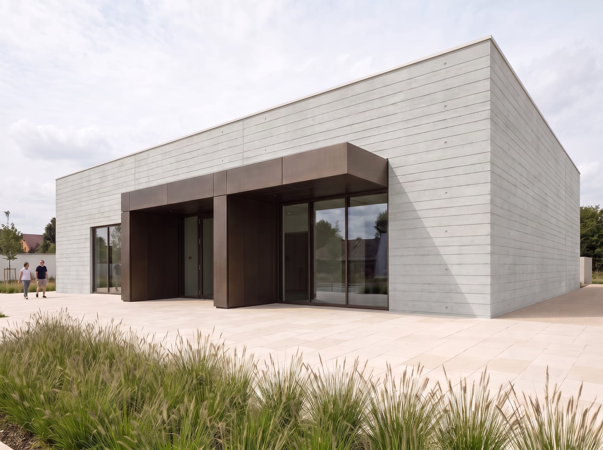 Board formed concrete pavilion after reducing surface reflectivity and refining the horizontal board texture.