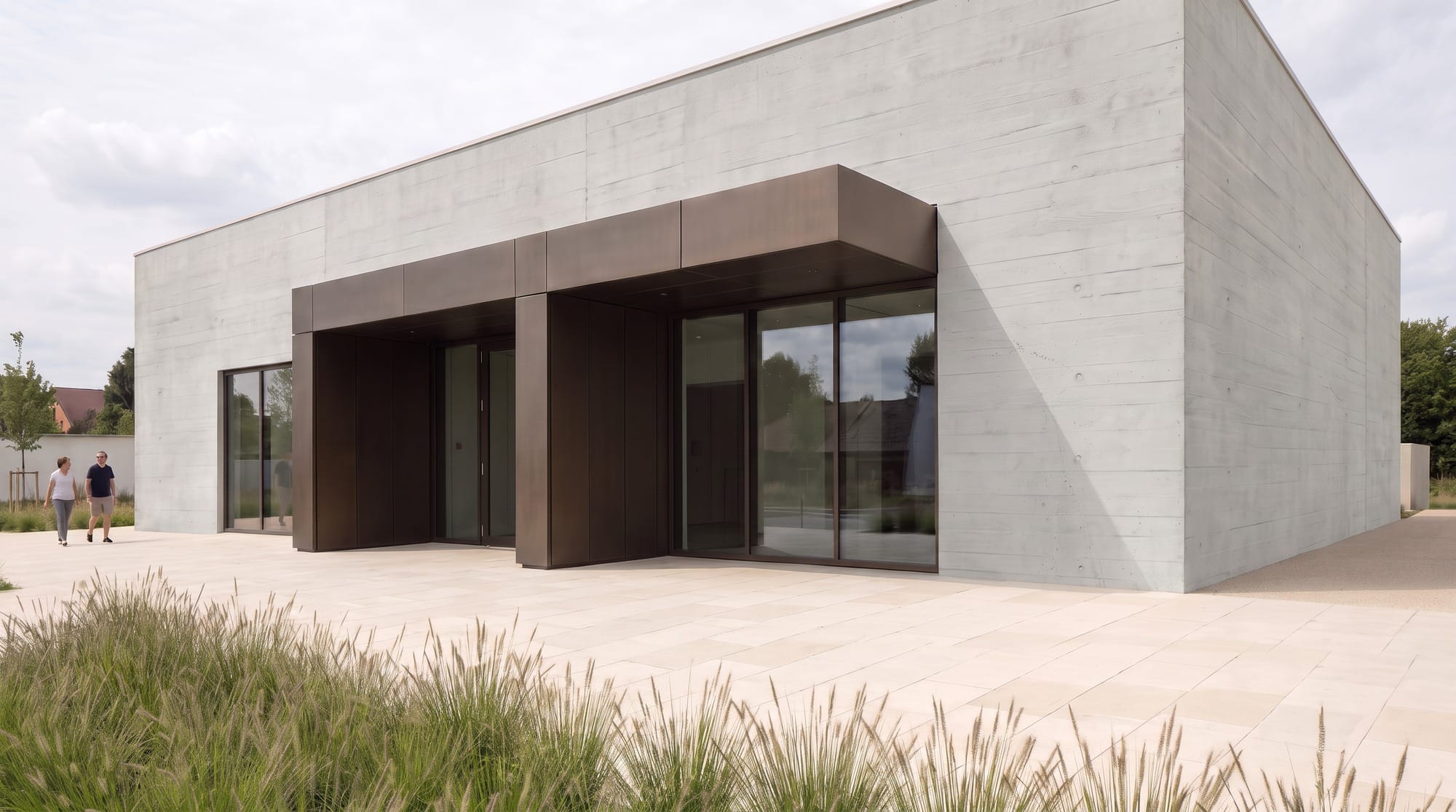 Board formed concrete facade after reducing reflectivity and refining the board texture.