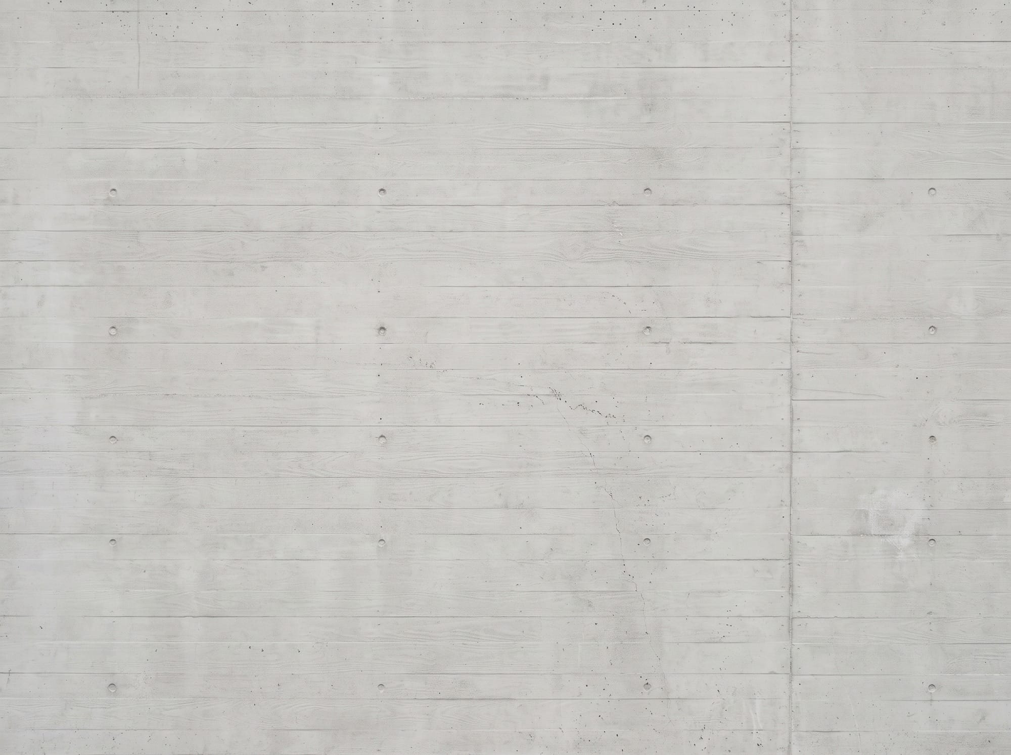 Image 2 showing pale board formed concrete used as the facade material reference.