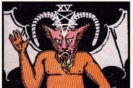 The Devil card, XV, showing a creature with curved horns, pointy ears, bat-like wings and a beard that looks like fire.