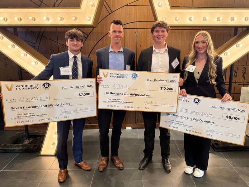 The Altaris MedTech team accepting first place at the SEC Student Pitch Competition at Vanderbilt University.