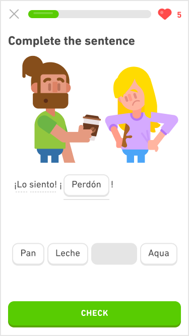 Screenshot of an immersion exercise in the Spanish course for English speakers. The instructions say "Complete the sentence" and below is an image of two people. On the left is a man with a brown beard and brown hair pulled back into a bun. He has a green t-shirt and his eyebrows are raised in surprise and his mouth is opened. He is holding out a to-go cup of coffee to the other person. On the right is a woman with long blonde hair looking down in disappointment at her purple shirt with a large coffee stain. Below the image is two sentences in Spanish, and the second one was a fill-in-the-blank that has been filled in with one of the words from the word bank below.