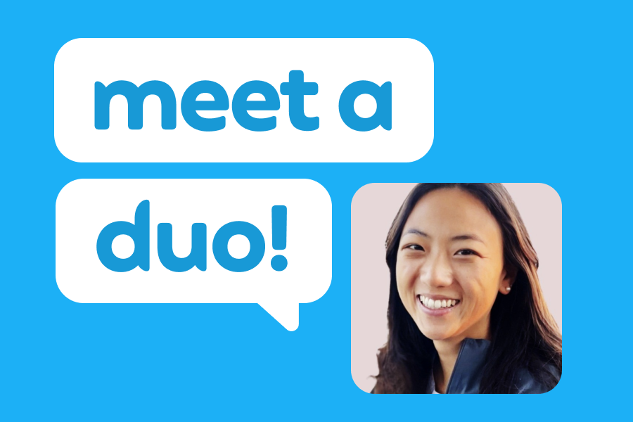 Illustration of a smiling woman next to two speech bubbles reading "Meet a Duo!"