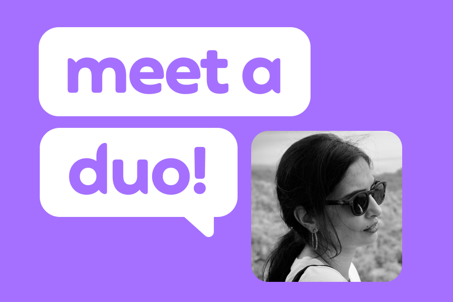 Illustration of a woman wearing sunglasses and looking into the distance, next to speech bubbles reading "Meet a Duo!"