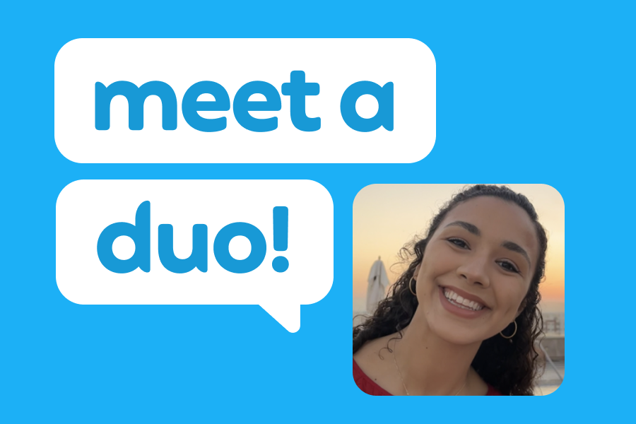Illustration of a smiling woman with a sunset behind her, next to speech bubbles that read "Meet a Duo!"