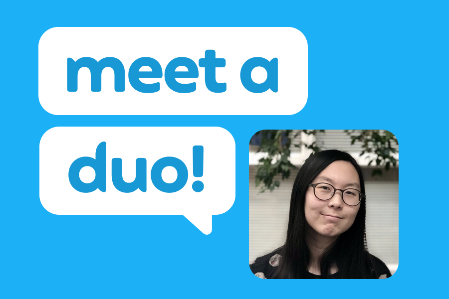 Headshot of Julie Wang next to speech bubbles that read "meet a duo!" on a blue background