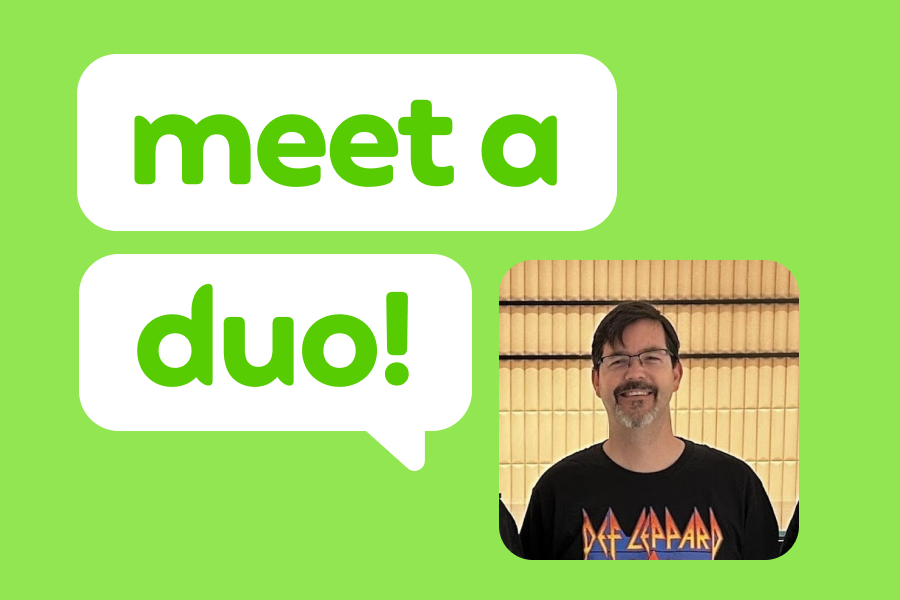 Photo of a smiling man wearing a black Def Leppard shirt next to the phrase "Meet a Duo!"