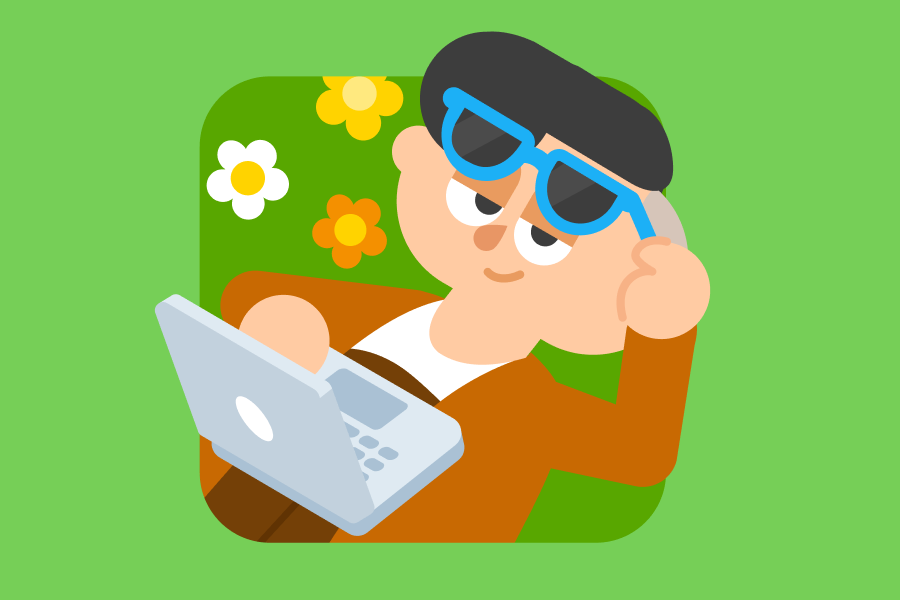 Lin est couchée dans l’herbe, entourée de fleurs et avec son ordinateur portable sur le ventre