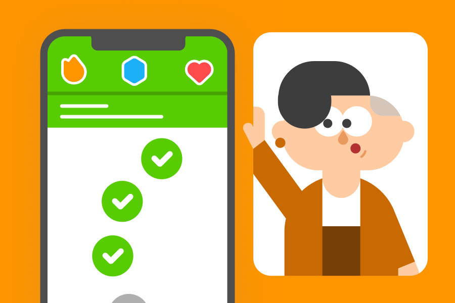 Lin looking in awe at a large phone screen that shows the Duolingo app. 