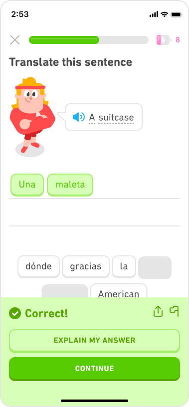 Screenshot of a Spanish exercise with the English phrase “A suitcase” correctly translated to “Una maleta”. The green pop-up says “Correct!” and includes a button that says “Explain My Answer.”