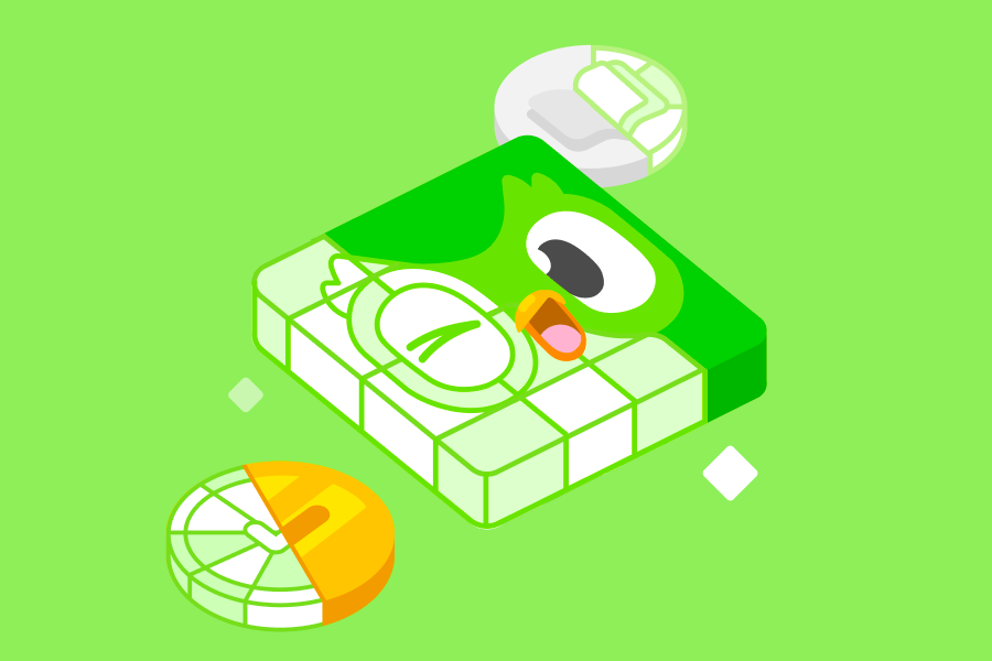 Tres elementos de la ruta de aprendizaje de Duolingo: una marca de verificación, un libro abierto y una imagen de Duo.