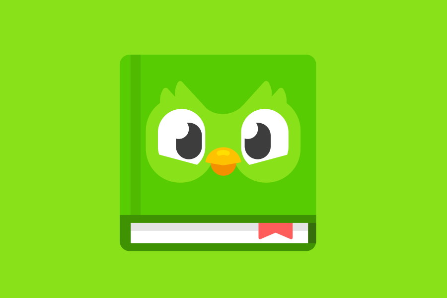 Un livre avec une couverture verte représentant Duo le hibou.