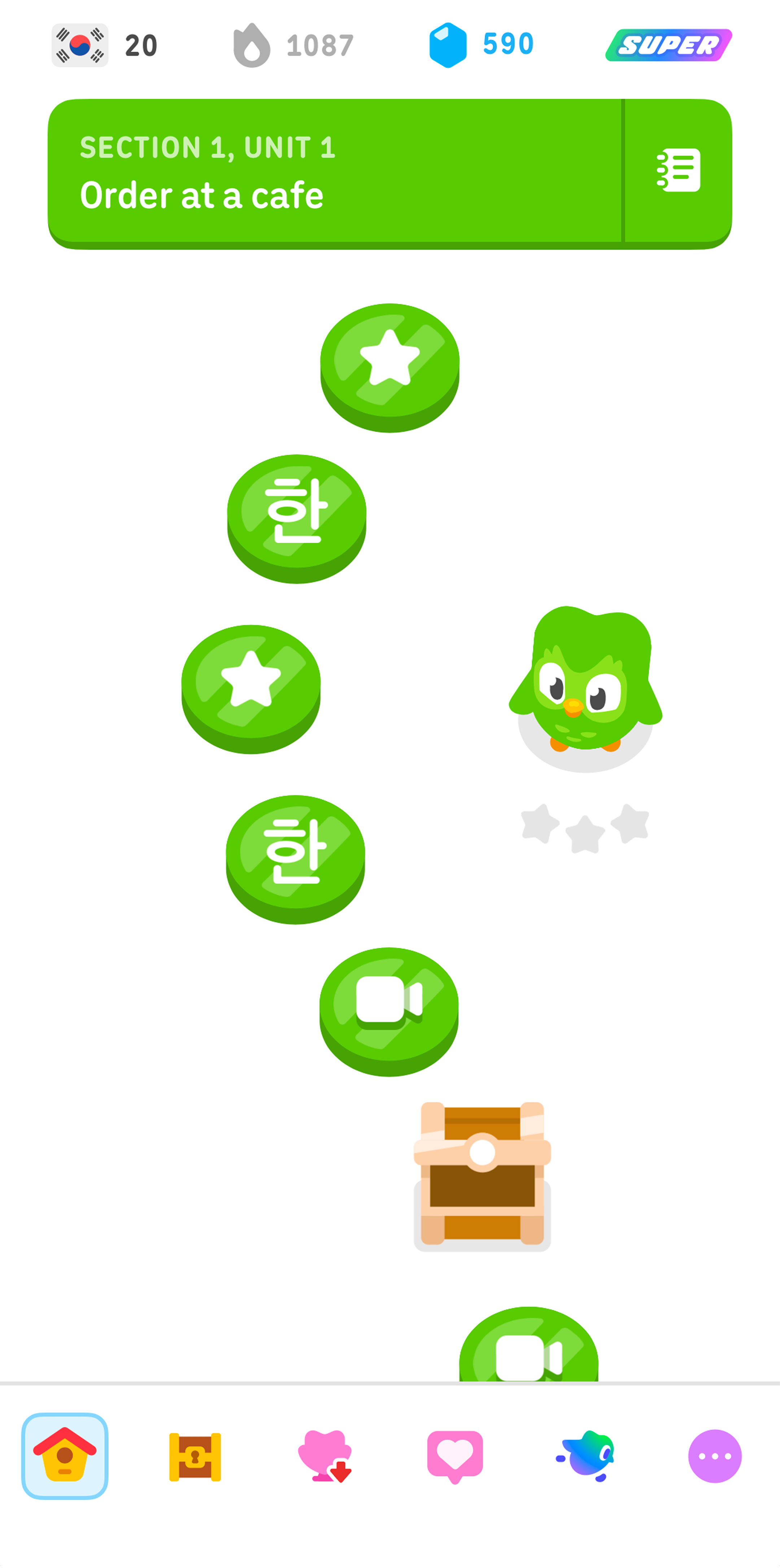 Screenshot of Duolingo’s learning path for the Korean course, which shows several Hangeul lessons throughout the unit. The current section is titled “Order at a cafe.”