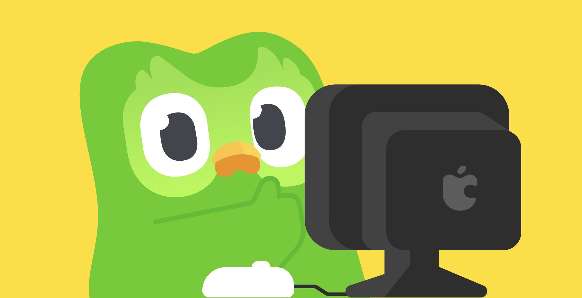 Duo giving a thumbs-up while sitting in front of a black desktop computer. 