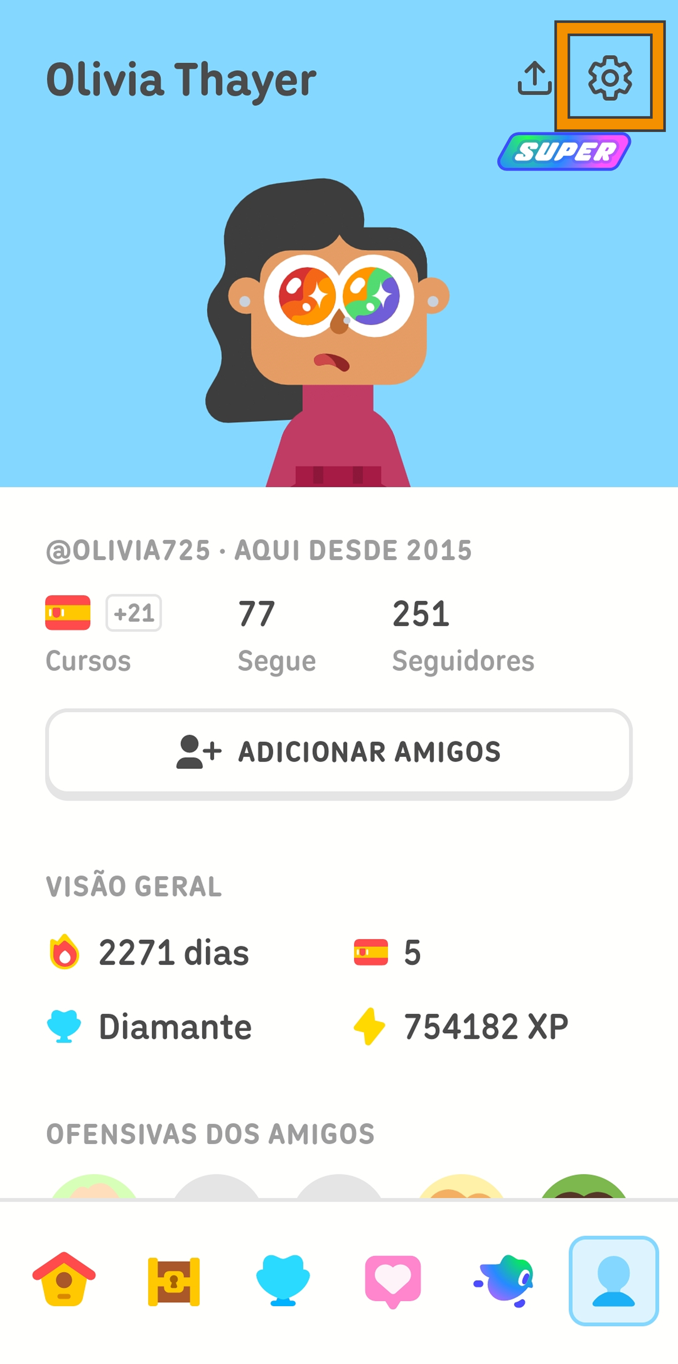 Captura de tela do perfil de uma aluna do Duolingo. Há um quadrado laranja que destaca o ícone de engrenagem no canto superior direito, indicando a opção que abre o menu de configurações.