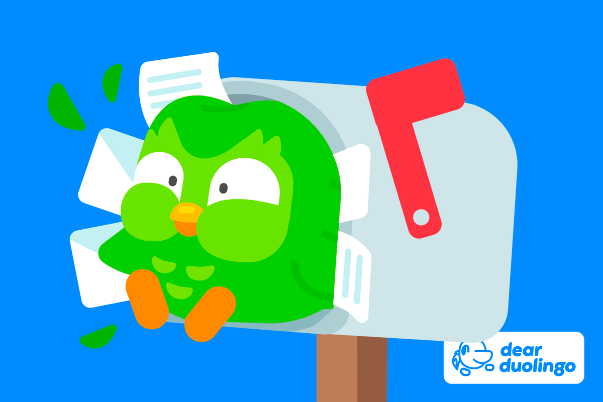 Illustration of Duo bursting from a mailbox filled with letters with the "Dear Duolingo" logo in the corner