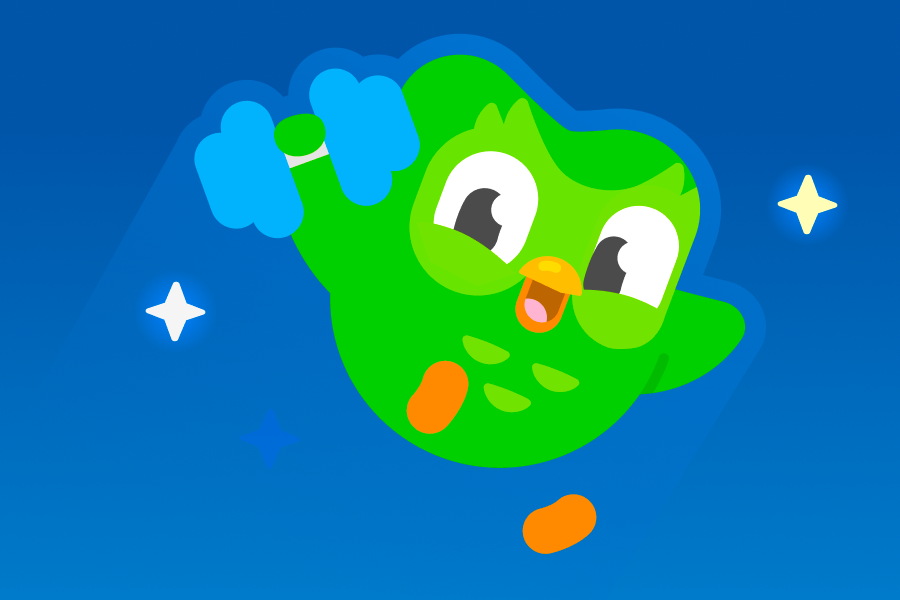 Duo the owl jumping in the air with a smile on his face, holding a blue dumbbell.