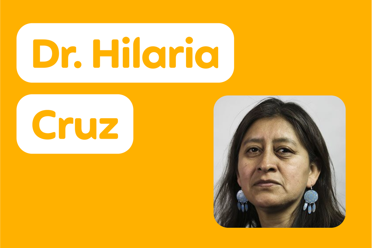 Der Name „Dr. Hilaria Cruz“, rechts daneben ihr Foto. Sie hat langes dunkles Haar und trägt blaue Ohrringe.