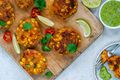 Corn Fritters with Smashed Avocado and Pickled Jalapeños