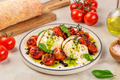 Burrata with Charred Tomatoes and Basil Oil