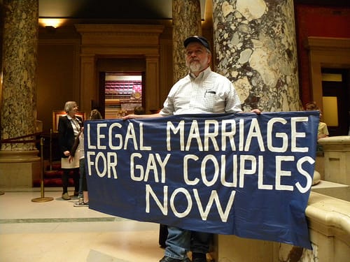 Gay marriage protester outside the Minnesota Senate chamber - photo by: Fibonacci Blue, Source: Flickr, found with Wylio.com Gay marriage protester outside the Minnesota Senate chamber