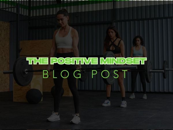 a group of women lifting weights