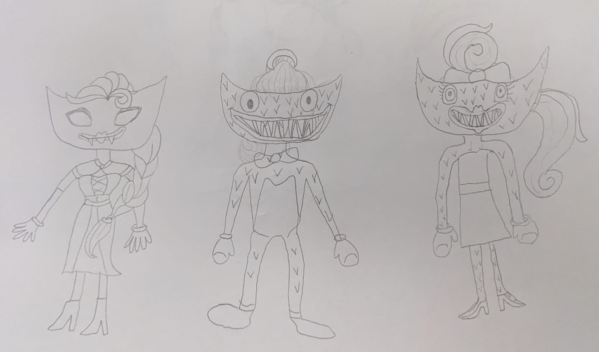 A drawing by one of my friend’s children of some strange gremlin looking creatures.