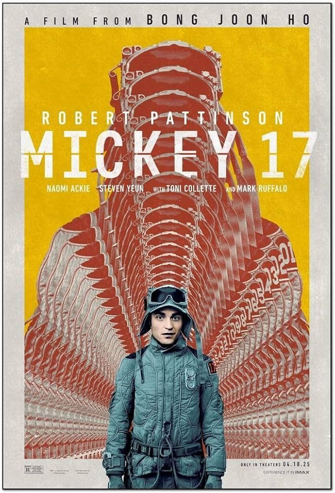 Robert Pattinson as Mickey 17, in his space suit, standing in front of the fading outline of 16 Mickey's before him. Movie poster.