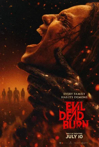 Evil Dead Burn poster, featuring Alice being grabbed by a demon in front of a fiery landscape. Tagline "Every family has its demons." "Only in theaters July 10."