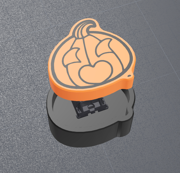 New design sneak peak. Orange and black heart pumpkin keyboard clicker.