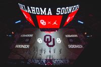 Overhead view of the basketball court at Lloyd Noble Center during an Oklahoma Sooners game.