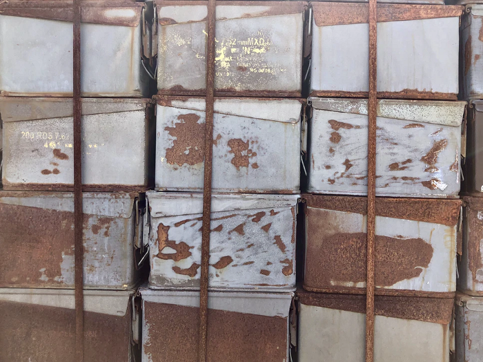 rusty crates piled high