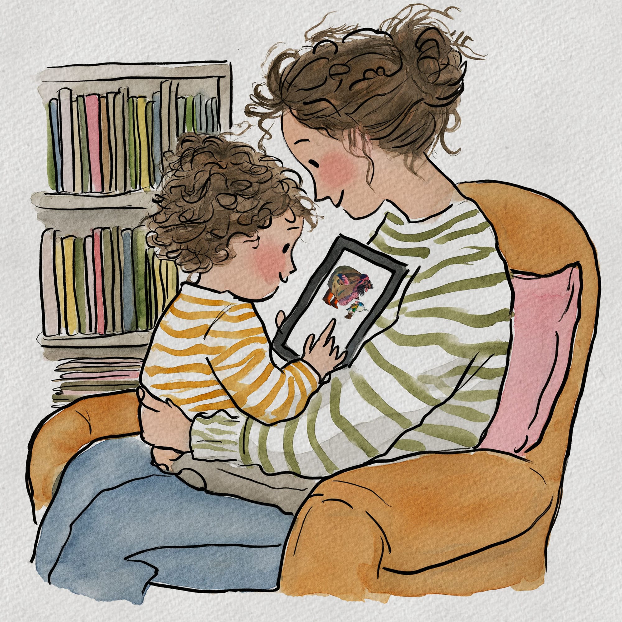 A toddler sits on an adult's lap in an armchair holding a tablet that shows an illustrated story page, with a full bookshelf behind them.