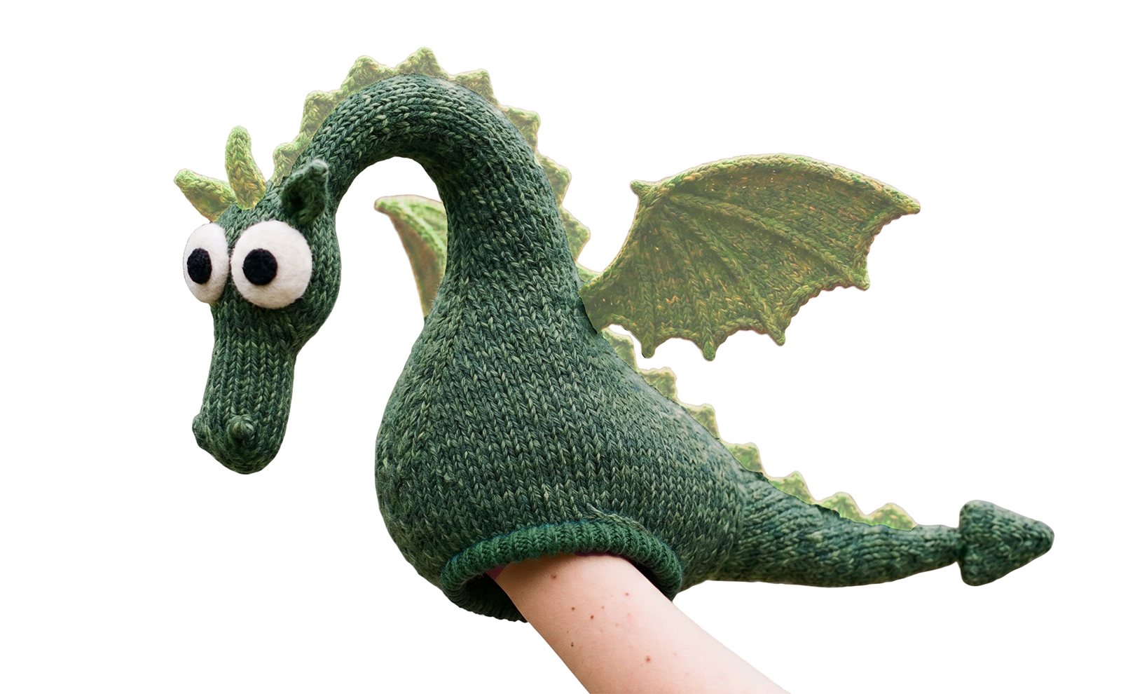 A knitted green dragon puppet on a child's arm, with a long curved neck, a lime-green spiked spine, big felt eyes and a lime-green bat wing.