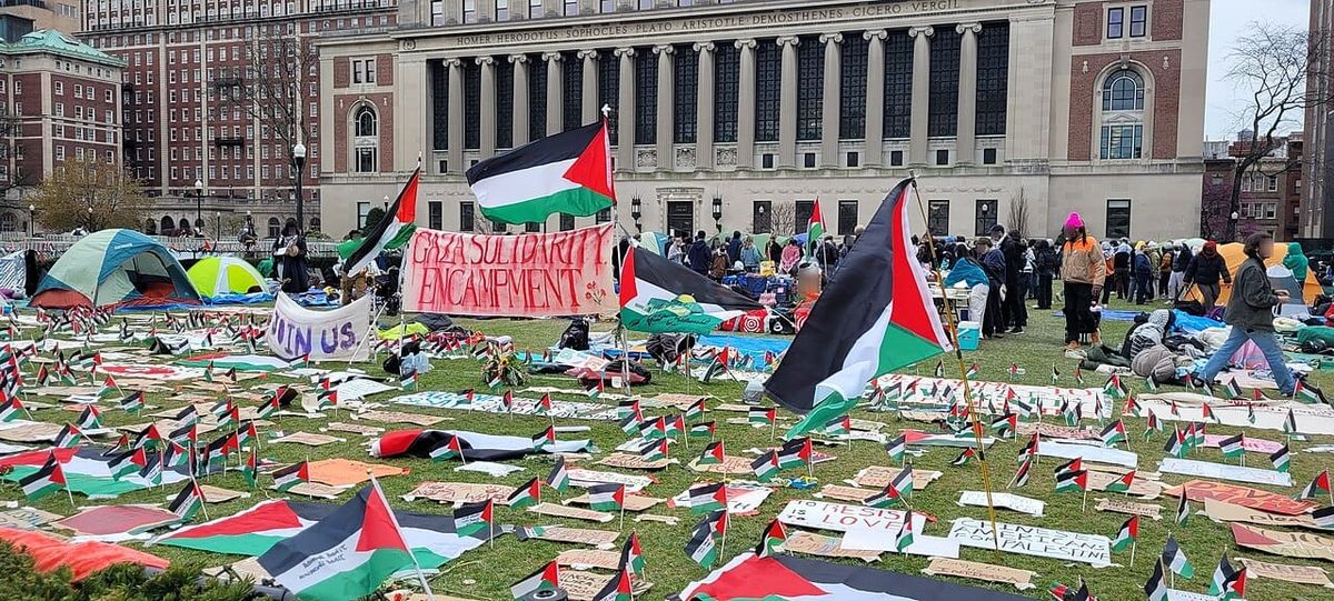 Palestinian flags and a crowd Columbia U campus