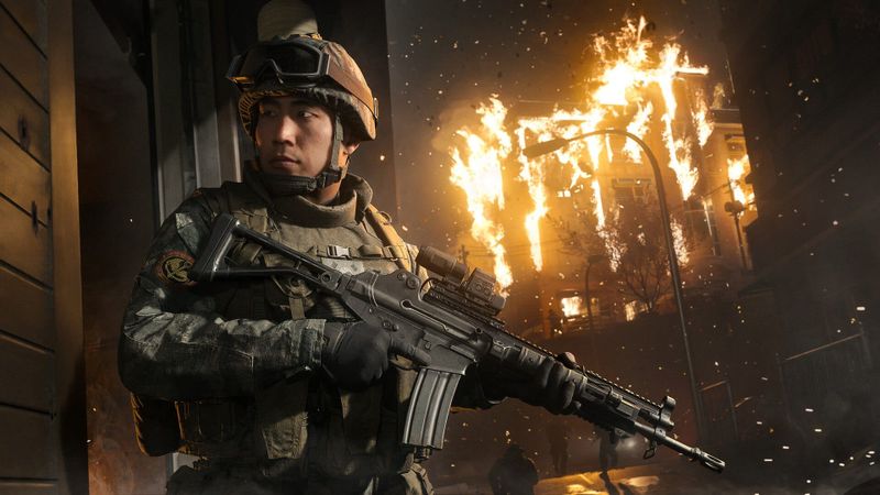 A soldier in a burning village in Call of Duty: Modern Warfare 4